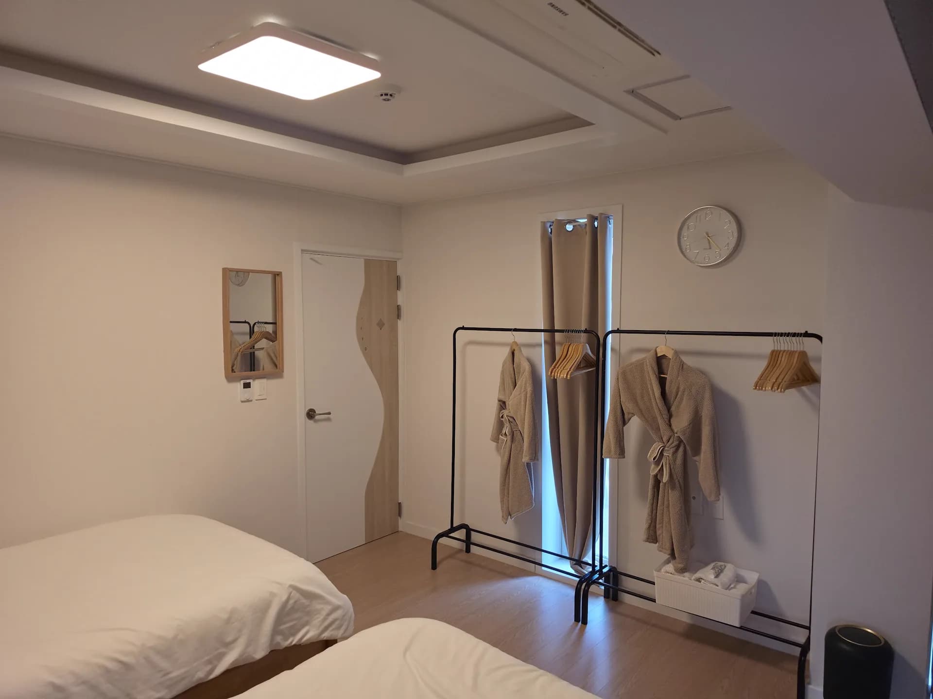 Twin bed room — wardrobe, robes, and dressing nook
