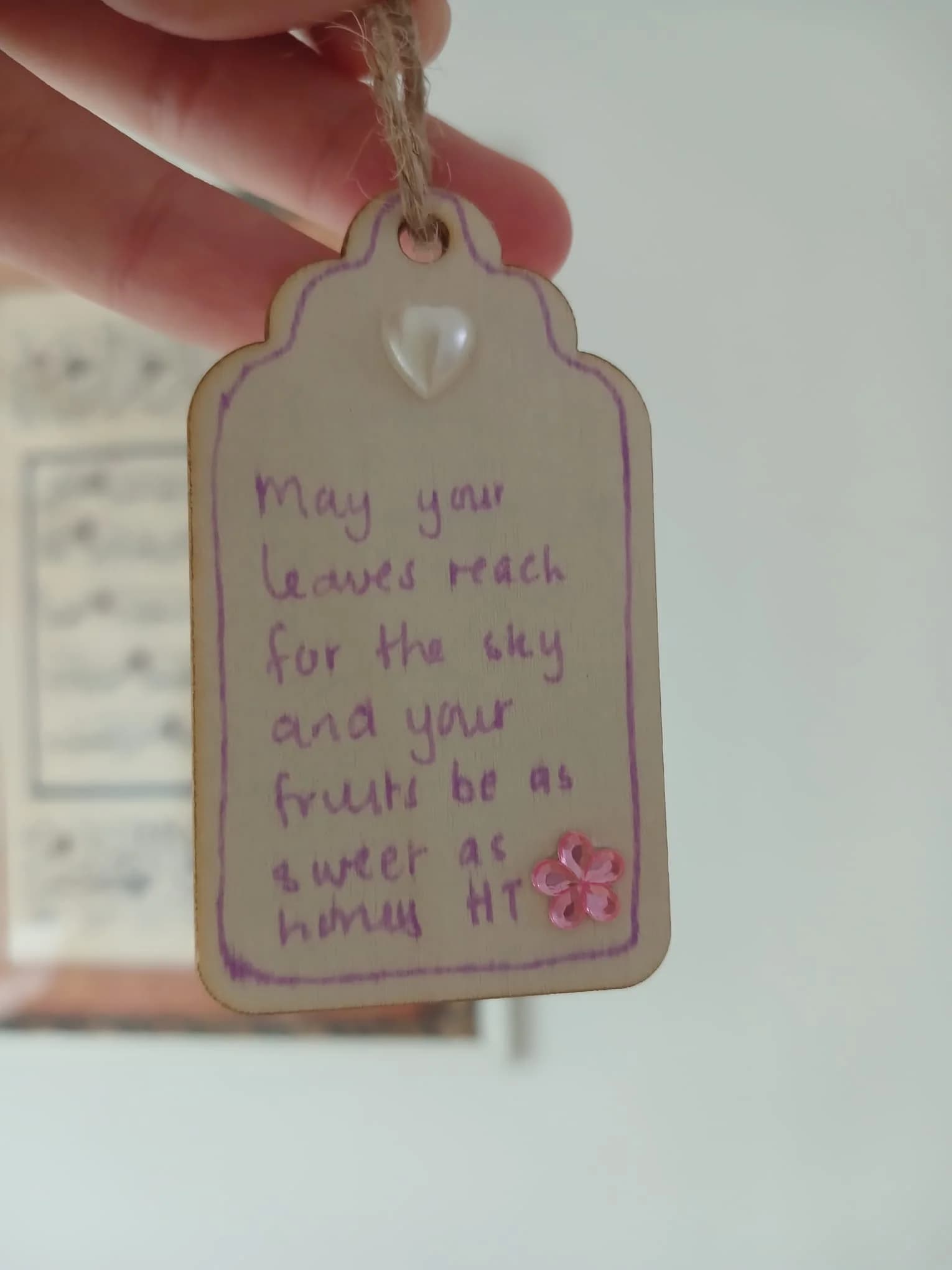 “May your leaves reach for the sky and your fruits be as sweet as honey” — a guest’s blessing tag, signed HT