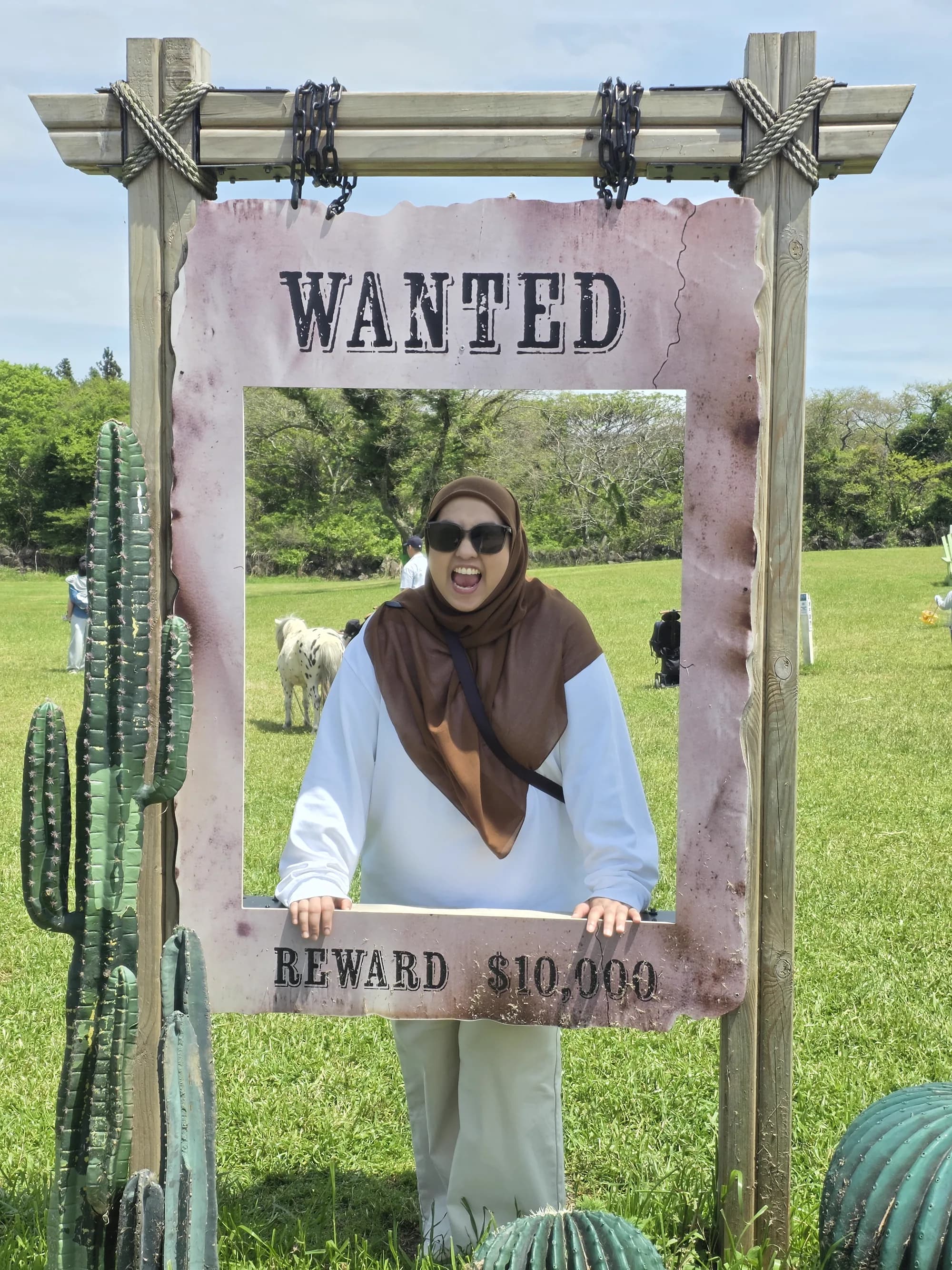 WANTED photo prop frame at a Jeju cactus garden