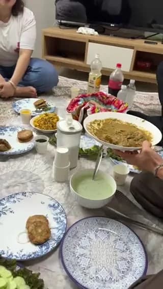 A shared Korean dinner spread at the table