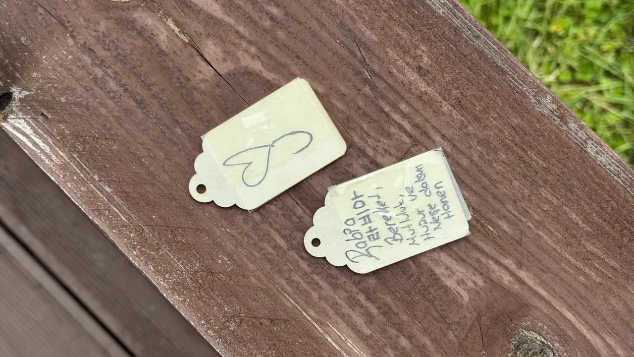 Handwritten dedication tags from the tree planting