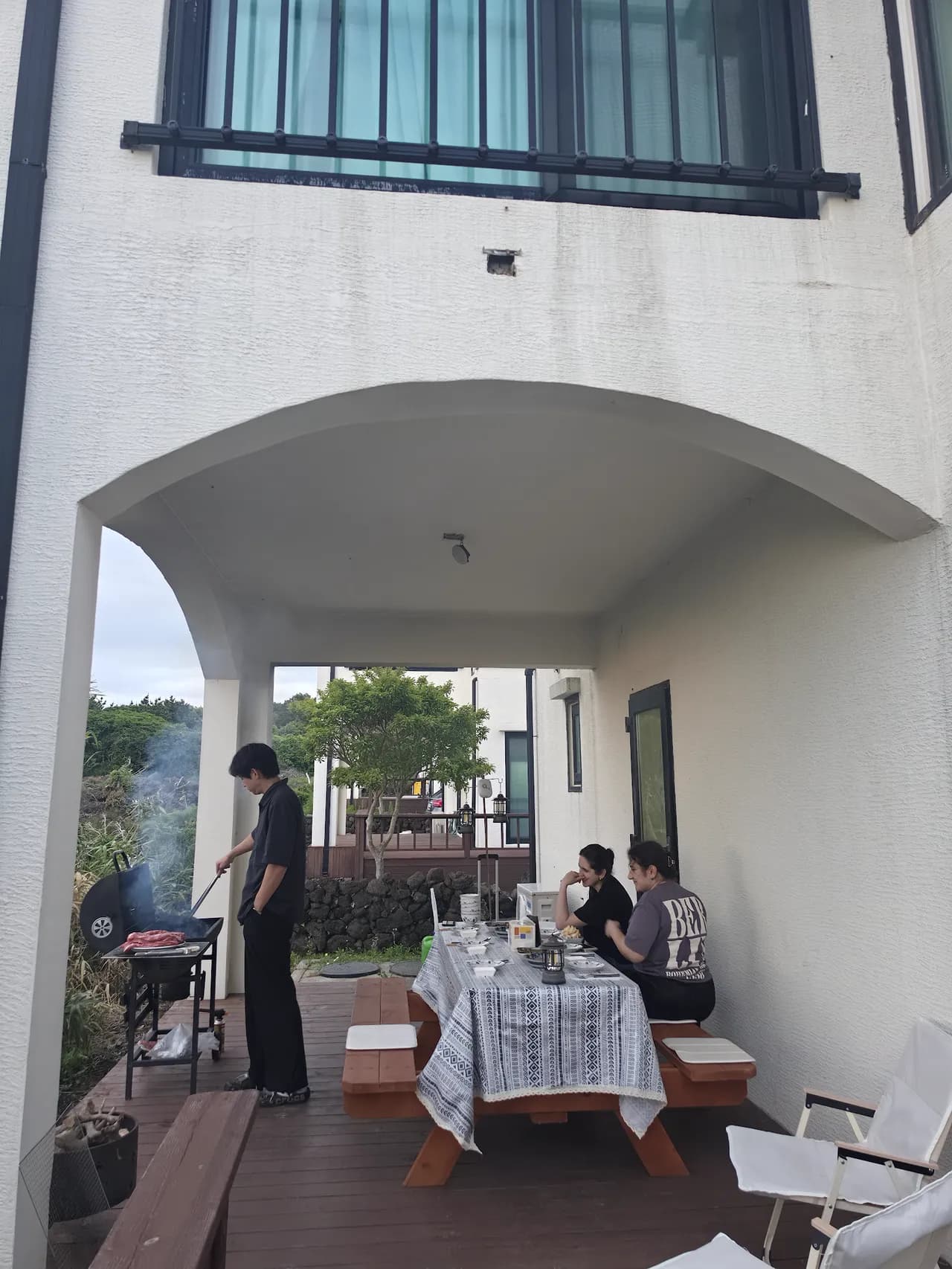 Whitewashed Santorini-style café terrace on the Jeju coast